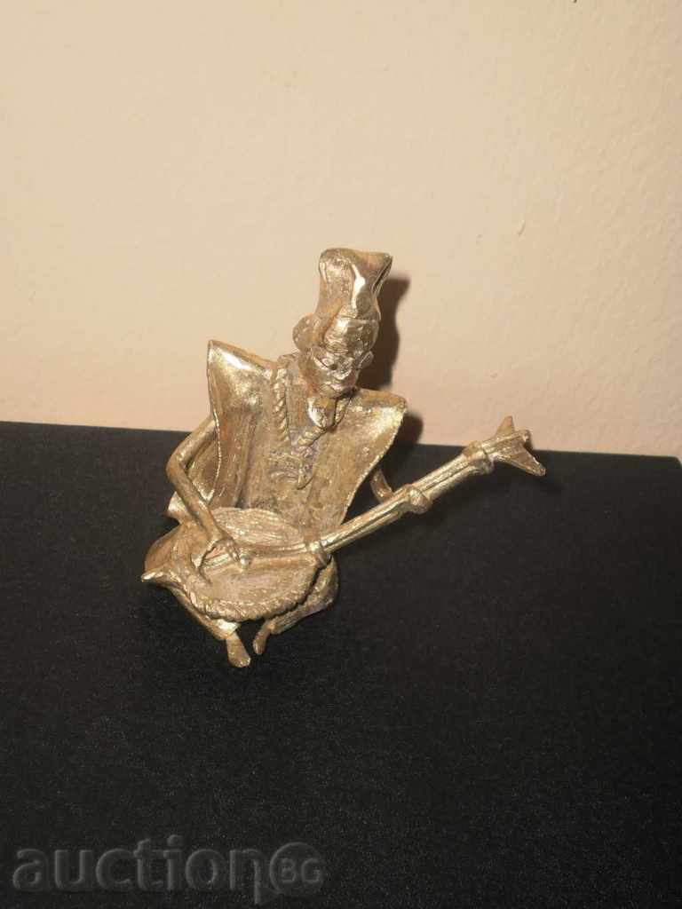 Delivery of Bronze figure of a musician with a calimba / hobbies / series Delivery of Bronze figure of a musician with a calimba / hobbies / series