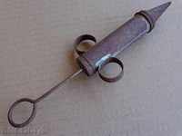 Old syringe, tool