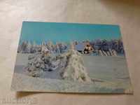 Carte poștală colibă ​​GDR în timpul iernii
