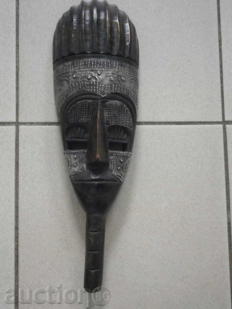 African mask with copper plating