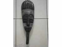 African mask with copper plating