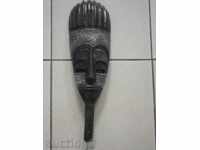 African mask with copper plating