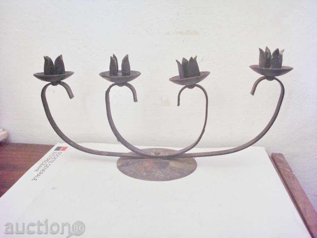 Old wrought iron candle holder