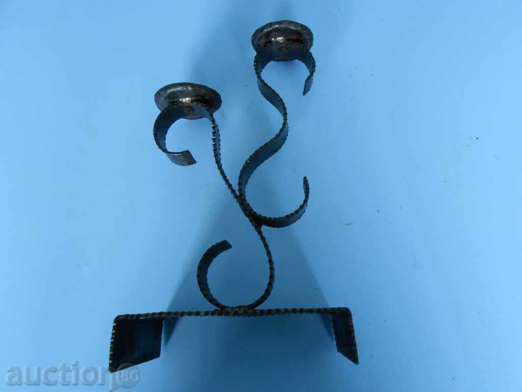Forged candelabra with price 10.00 BGN | € 5.11