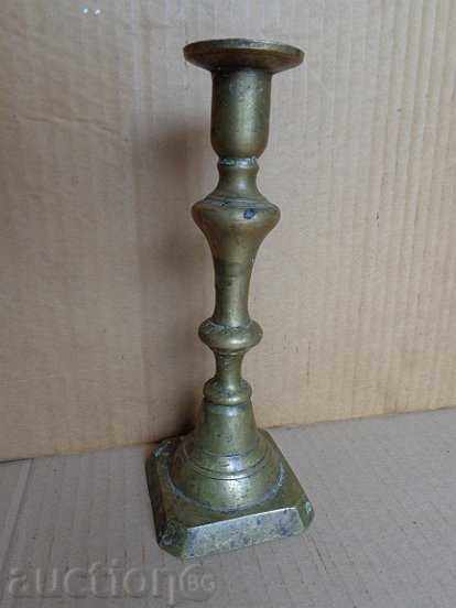 Old bronze candlestick, lamp, lantern, candle