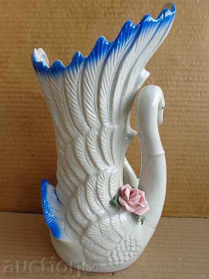 Auction An old porcelain vase with swans, porcelain Auction An old porcelain vase with swans, porcelain