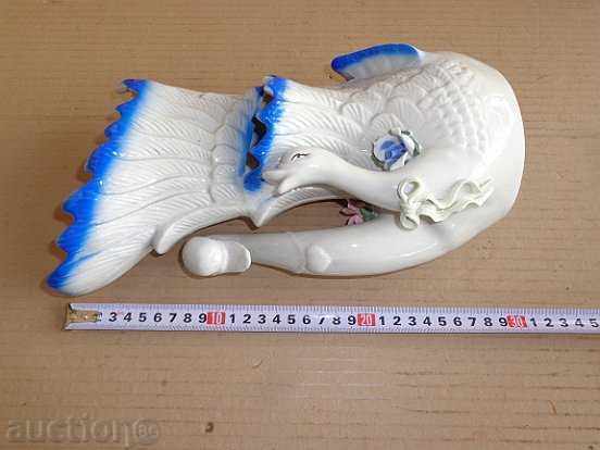 Delivery of An old porcelain vase with swans, porcelain Delivery of An old porcelain vase with swans, porcelain