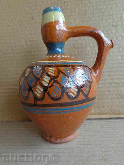 Bitter pitcher, pottery, bitumen
