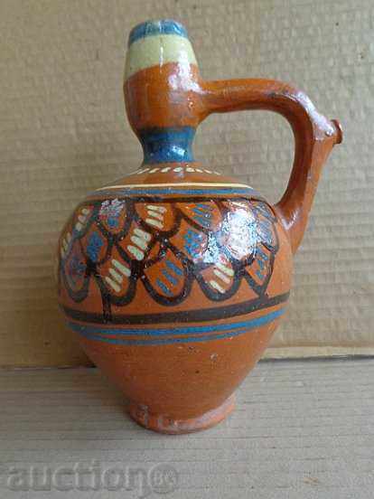 Colorful jug, ceramics, burduk Colorful jug, ceramics, burduk
