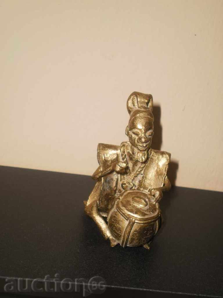 Auction  Bronze figure of a musician with a tarambuka-series