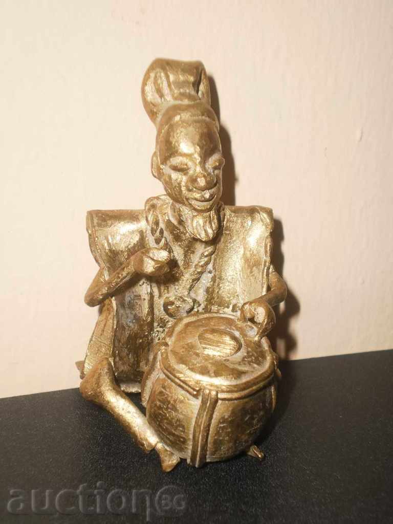 Bronze figure of a musician with a tarambuka-series