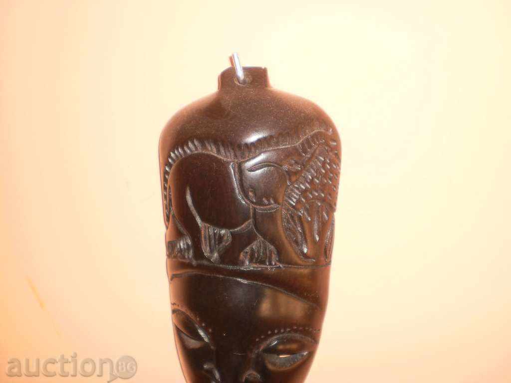 Auction African ebony mask with an Moley elephant Auction African ebony mask with an Moley elephant