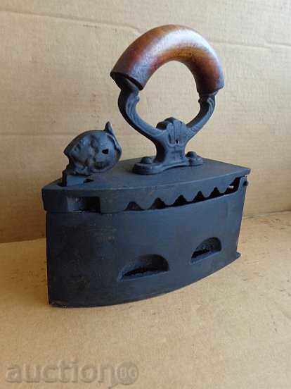 Auction  An old iron on fire