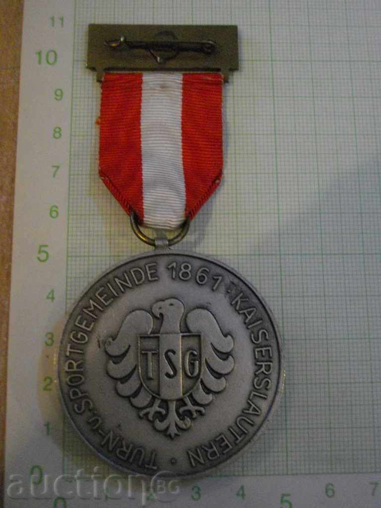 Medal "INTERNATIONALER VOLKSWANDERTTAG KAISERSLAUTERN" with price 60.00 BGN | € 30.68 Medal "INTERNATIONALER VOLKSWANDERTTAG KAISERSLAUTERN" with price 60.00 BGN | € 30.68