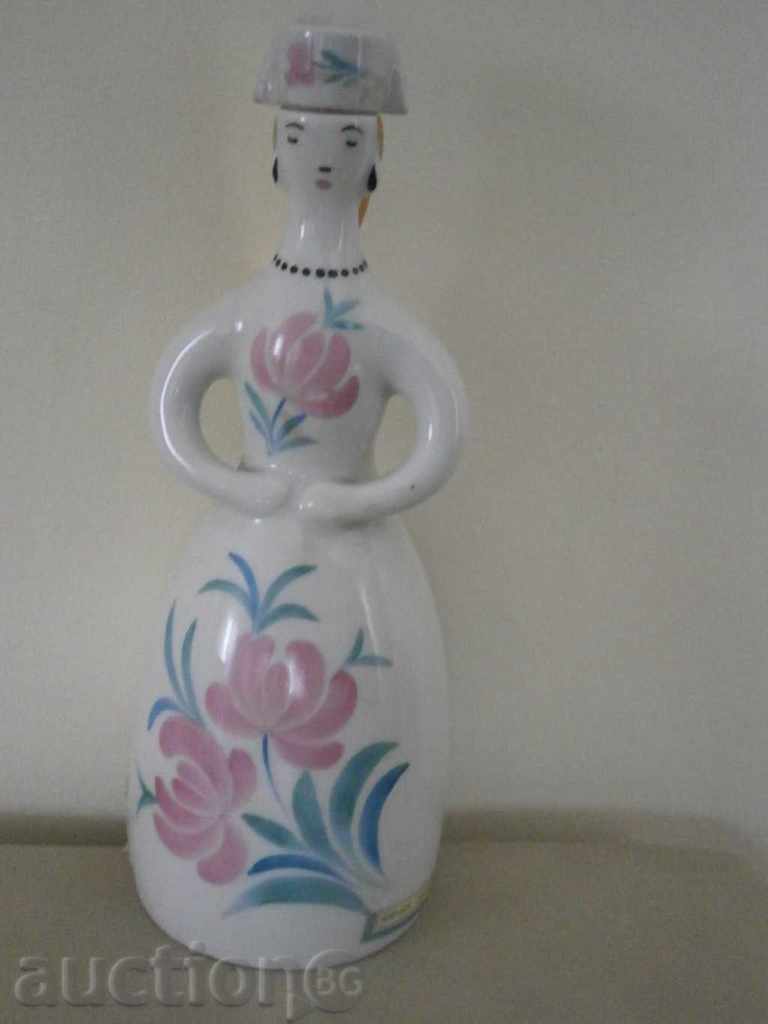 Auction Decorative porcelain bottle in the shape of a girl from the USSR Auction Decorative porcelain bottle in the shape of a girl from the USSR