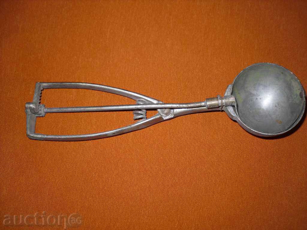 An old professional ice cream spoon