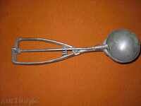 An old professional ice cream spoon