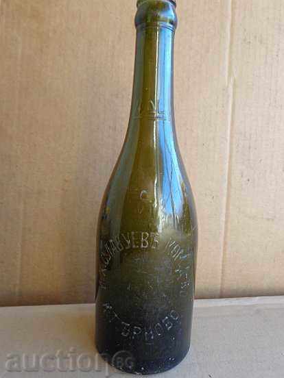 An old beer bottle, a bottle, a glass, a tamarind
