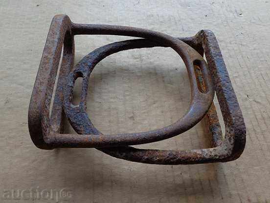 Delivery of Old iron stirrups, spurs, reins, saddle, cavalry Delivery of Old iron stirrups, spurs, reins, saddle, cavalry