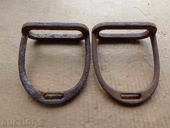 Old iron stirrups, spurs, reins, saddle, cavalry Old iron stirrups, spurs, reins, saddle, cavalry