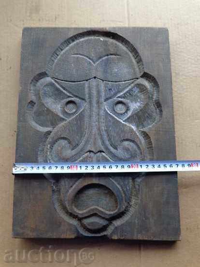 Auction  Old wooden panel, wood mask, carving