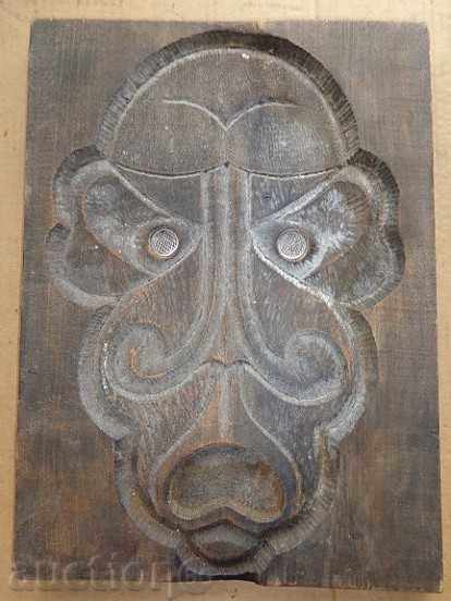 Delivery of Old wooden panel, wood mask, carving