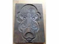 Old wooden panel, wood mask, carving