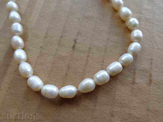 An old pearl necklace, a necklace, a necklace, a pearl with price 25.00 BGN | € 12.78 An old pearl necklace, a necklace, a necklace, a pearl with price 25.00 BGN | € 12.78