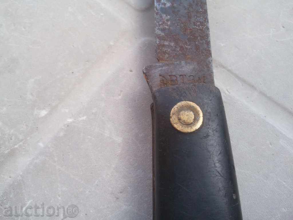 Delivery of an old knife with a sickle and a hammer strong