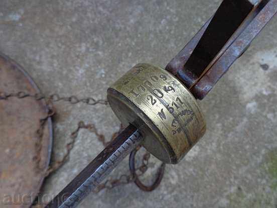Delivery of Old balance scale weight scale from the 30s of the 20th century Delivery of Old balance scale weight scale from the 30s of the 20th century