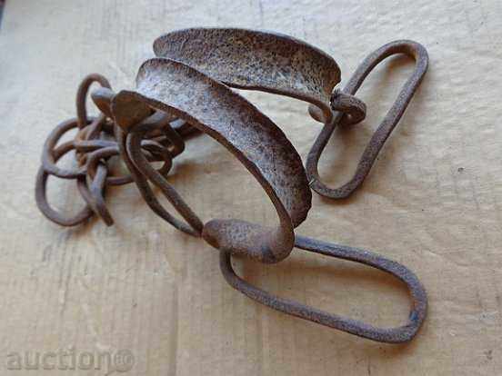 Auction  Eyebrows, pillows, handcuffs, chains, wrought iron