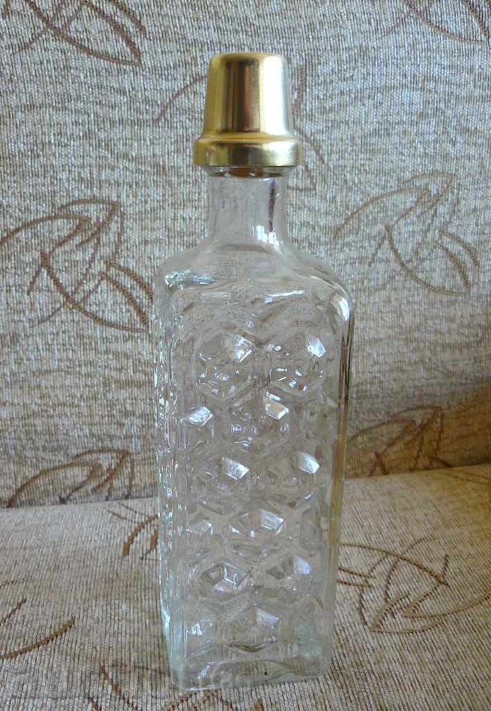 Bottle with a cup