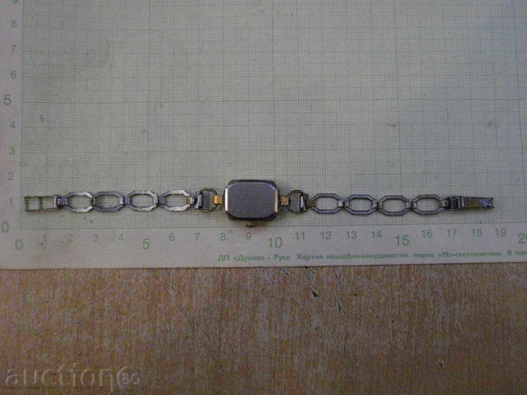 Auction Woman working clock Auction Woman working clock