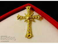 Gold-plated silver cross.