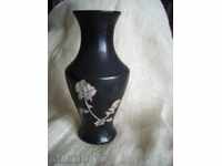 I'm selling a graphite vase with a mother of pearl