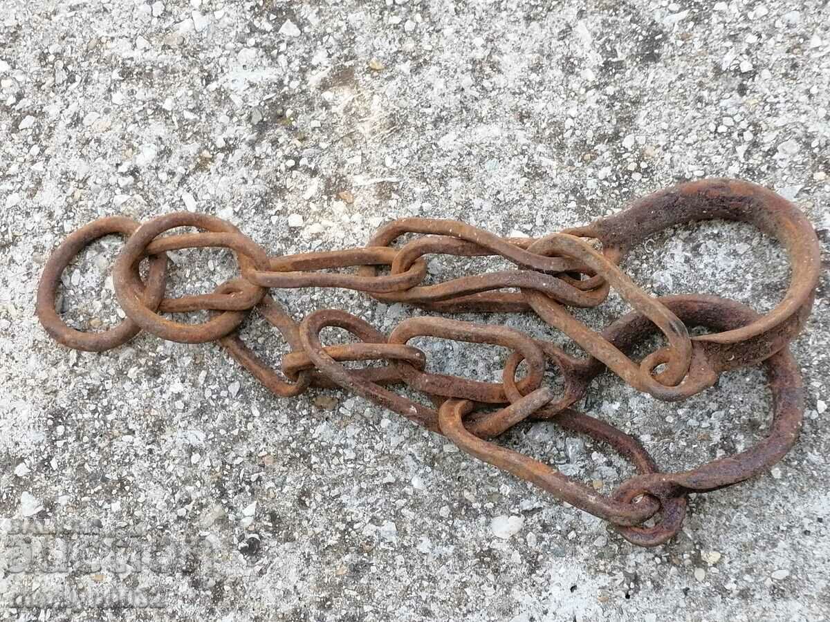 Auction  Old buckles, clasps, chains, wrought iron