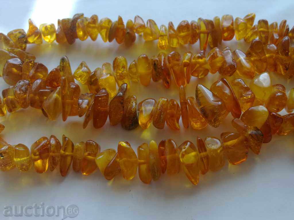 Δημοπρασία πορτοκαλί κολιέ Δημοπρασία πορτοκαλί κολιέ