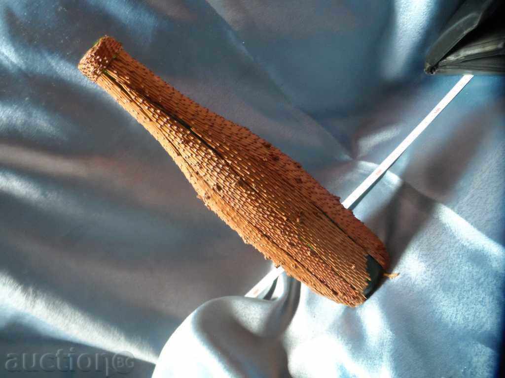 an old glass bottle decorated with the bark of a coniferous tree - 5 an old glass bottle decorated with the bark of a coniferous tree - 5