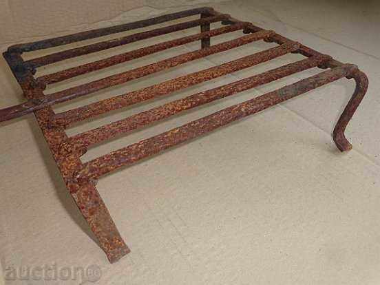 Auction An old metal grill, wrought iron, a barbecue Auction An old metal grill, wrought iron, a barbecue