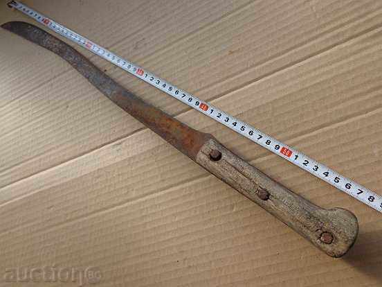 Auction An old scimitar, a karakulak, a primitive knife, a pickaxe Auction An old scimitar, a karakulak, a primitive knife, a pickaxe