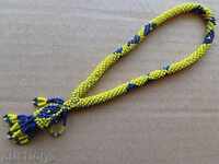 An old beaded rosary, a necklace