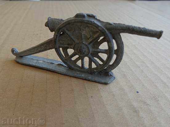 Delivery of Child lead military toy top lead figure late 19th century Delivery of Child lead military toy top lead figure late 19th century