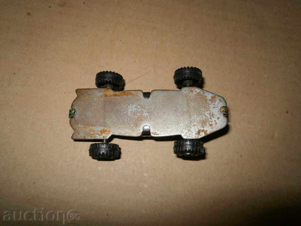 Auction a small metal stroller Auction a small metal stroller