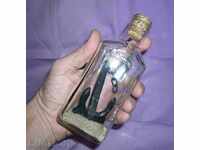 A unique model of the COAT in a bottle