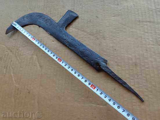 Auction  An old hand-forged hammer with primitive engravings, wrought iron