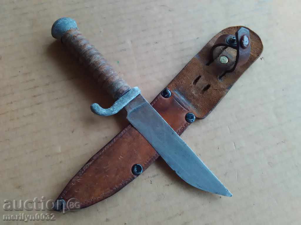 An old knife with a guard and a cane of a warrior named Hitler with price 69.00 BGN | € 35.28