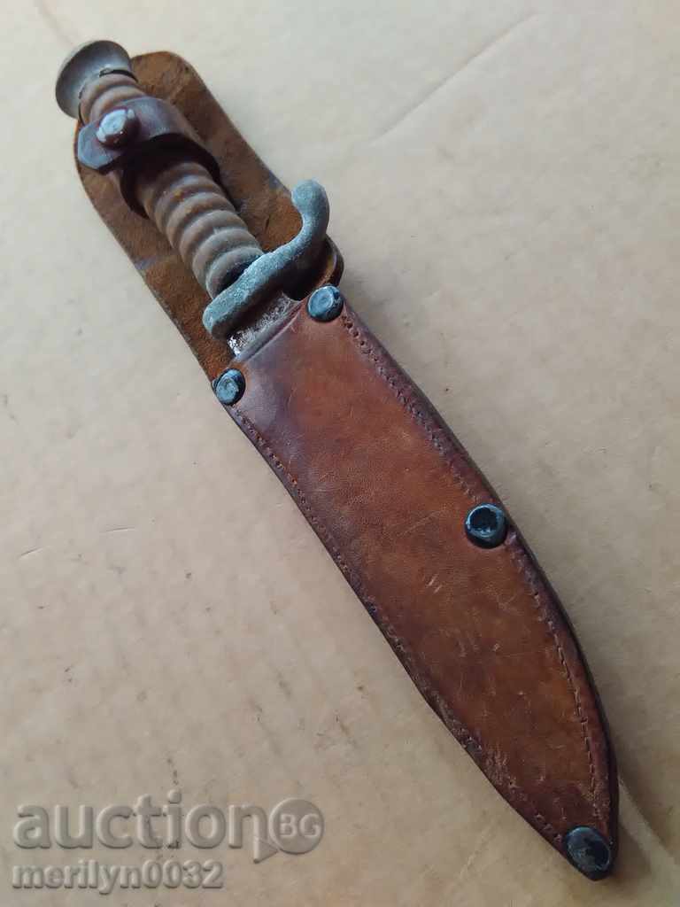 Auction  An old knife with a guard and a cane of a warrior named Hitler