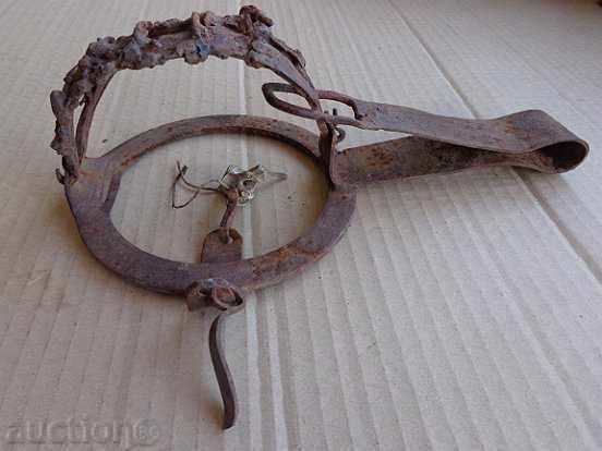 Old hand forged trap, wrought iron