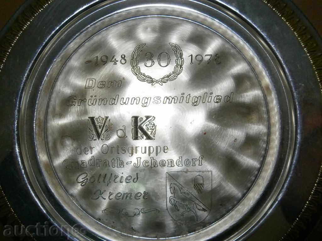Delivery of metal wall gift plate