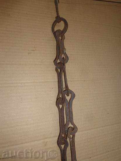 Delivery of Old forged chain with hook, hearth for hearth Delivery of Old forged chain with hook, hearth for hearth